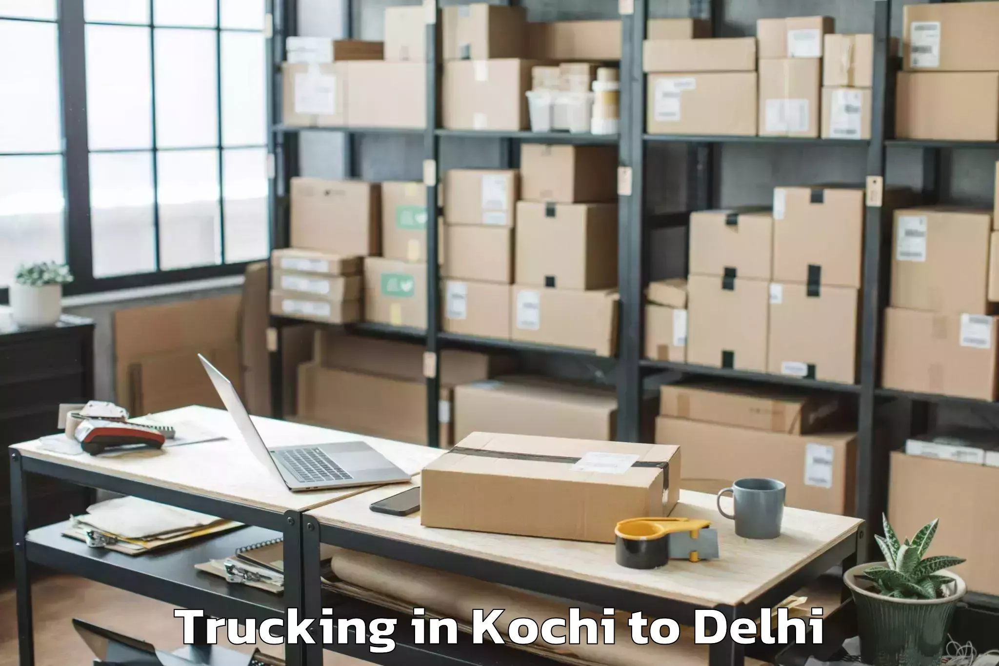 Top Kochi to Aggarwal City Mall Pitampura Trucking Available